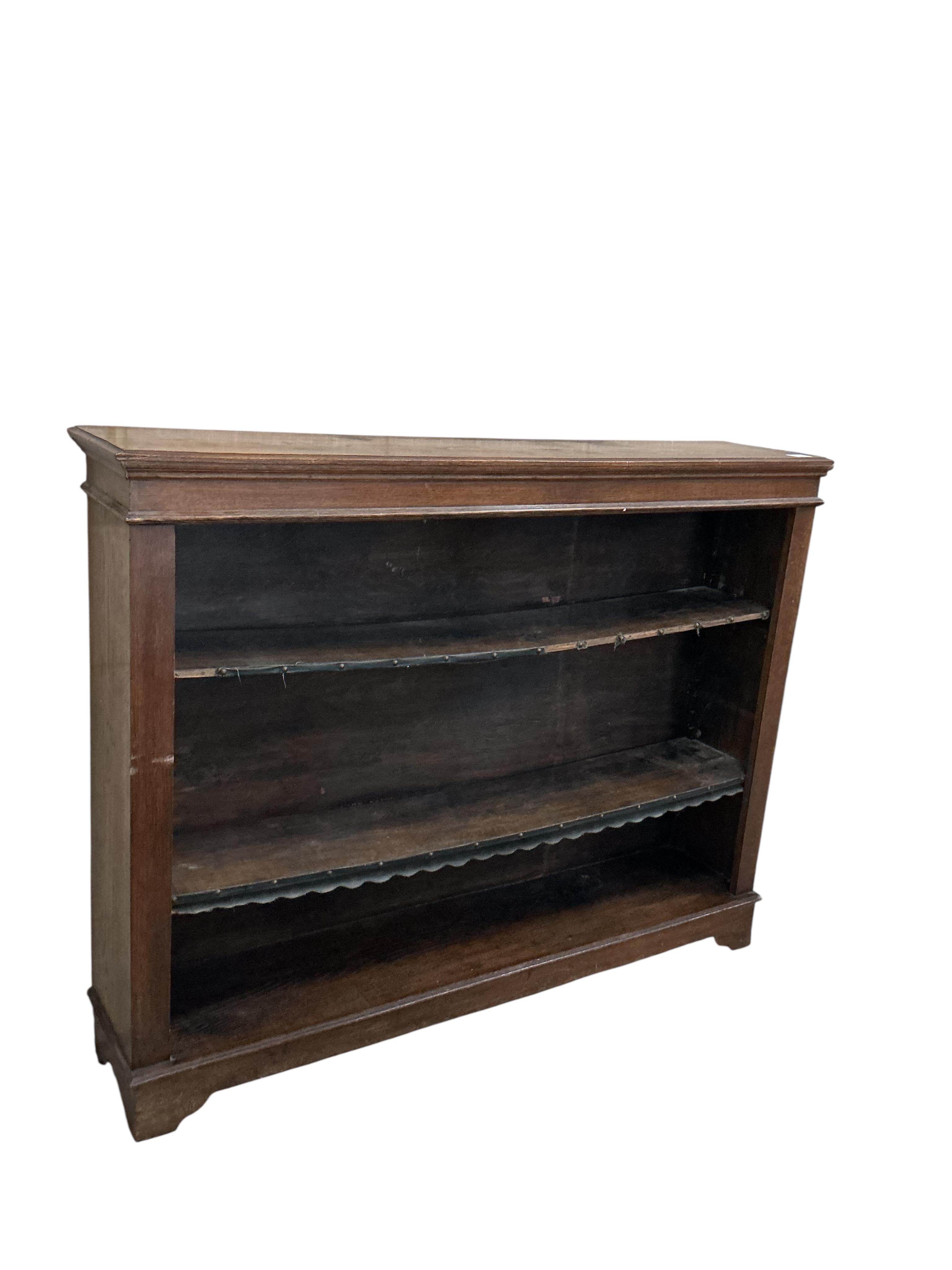 A Victorian oak open bookcase, width 138cm, depth 29cm, height 106cm
